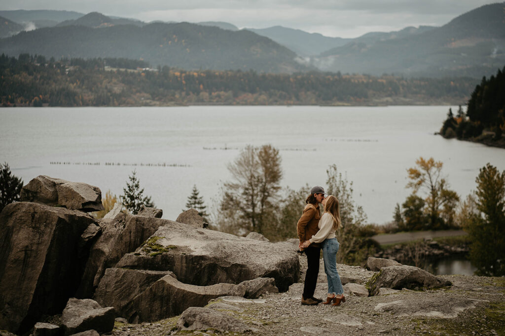 A newlywed couple kissing for their Columbia River Gorge engagement. 