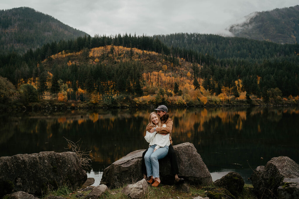 a newly engaged couple embracing each other in the Columbia River Gorge. 