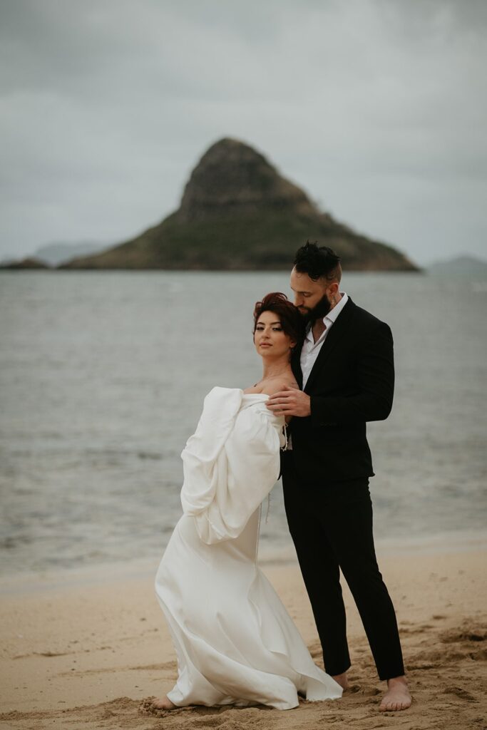 Bride and groom elopement photos on a beach in Hawaii