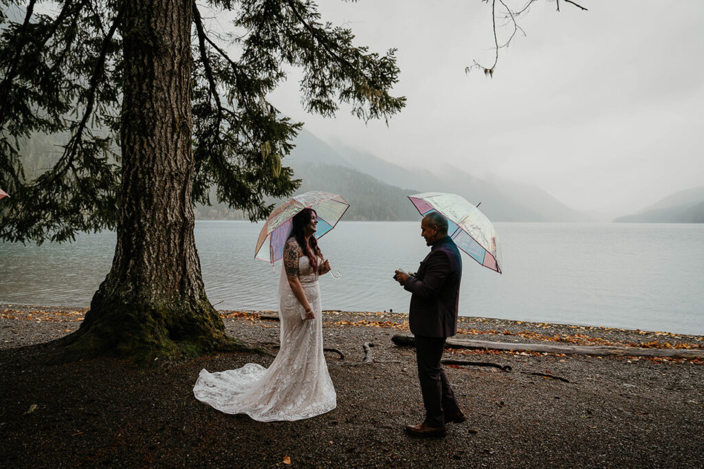The groom exchanging his vows to his wife during their Lake Crscent elopement. 