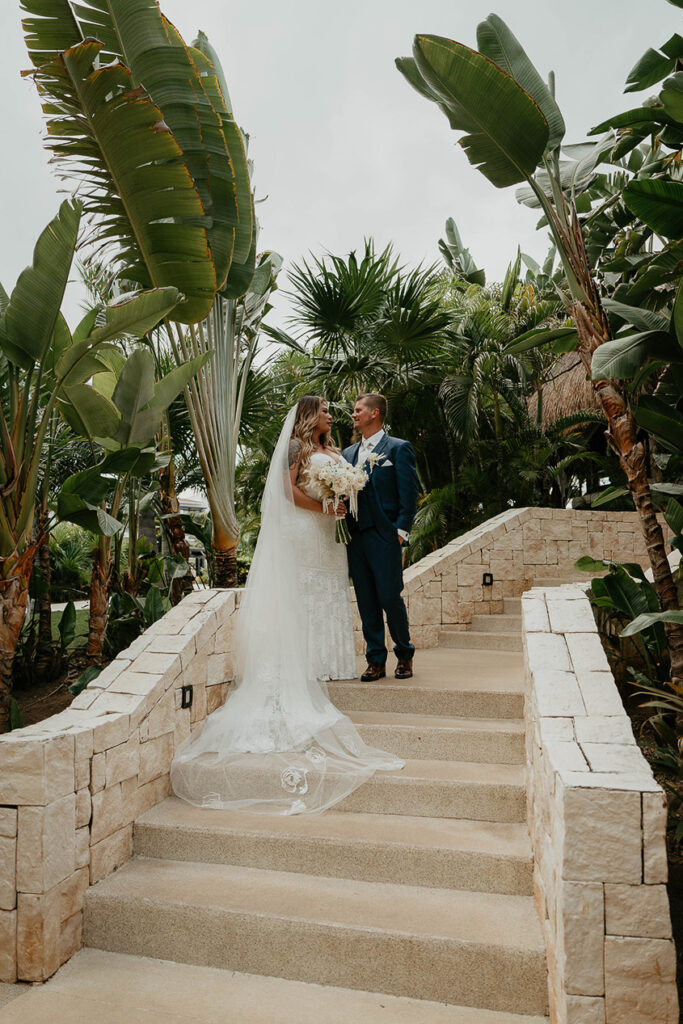 The bride and groom looking lovingly into each other's eyes during their Mexico destination wedding. 