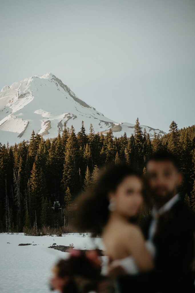 Bride and groom hug during their Mt Hood elopement in the pacific northwest