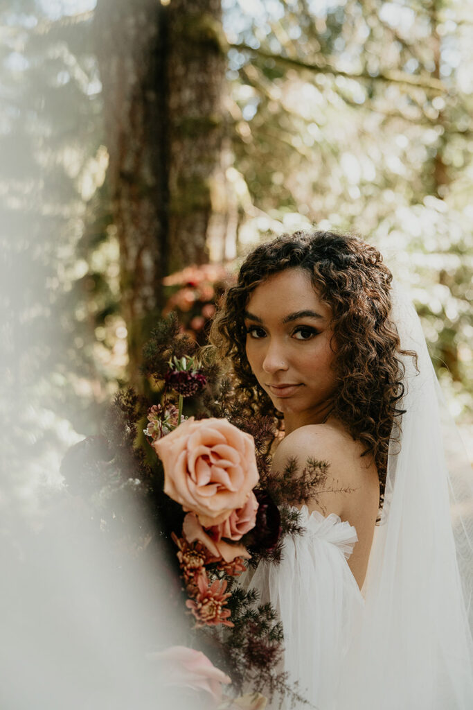 the bride showing off her veil. 