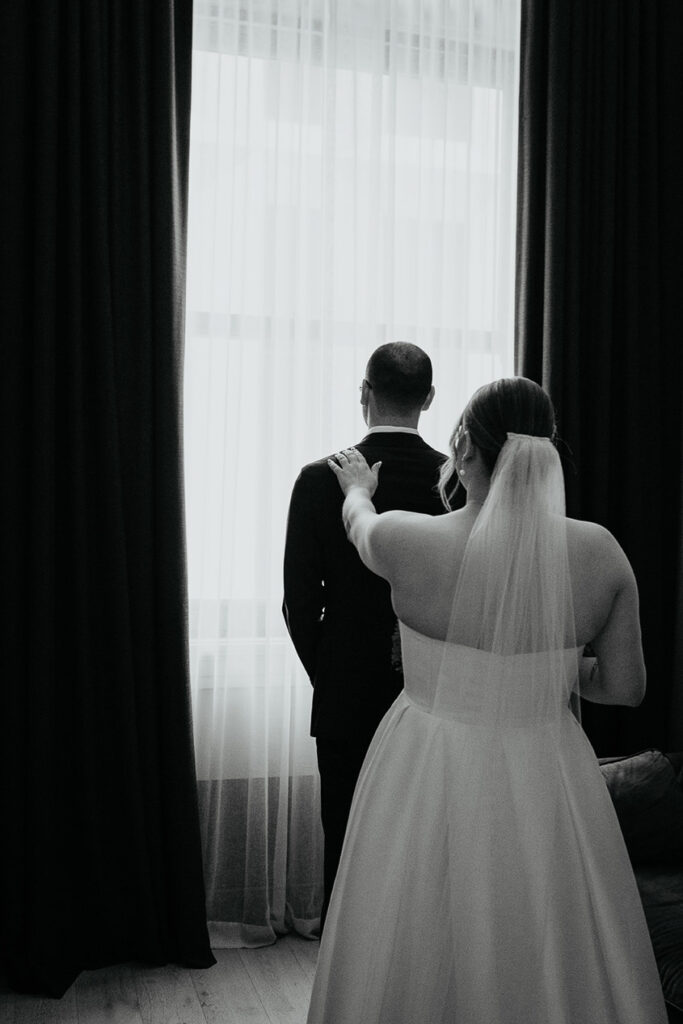 the bride and groom doing their first look. 