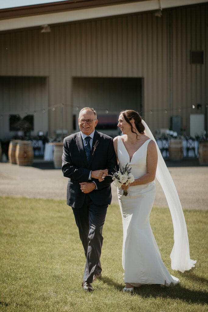 the bride's father walking her down the isle. 