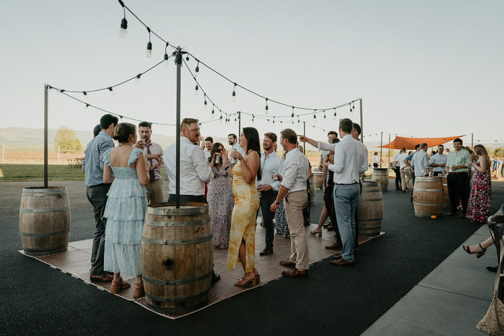 couples mingling during cocktail hour at a Dusted Valley wedding. 