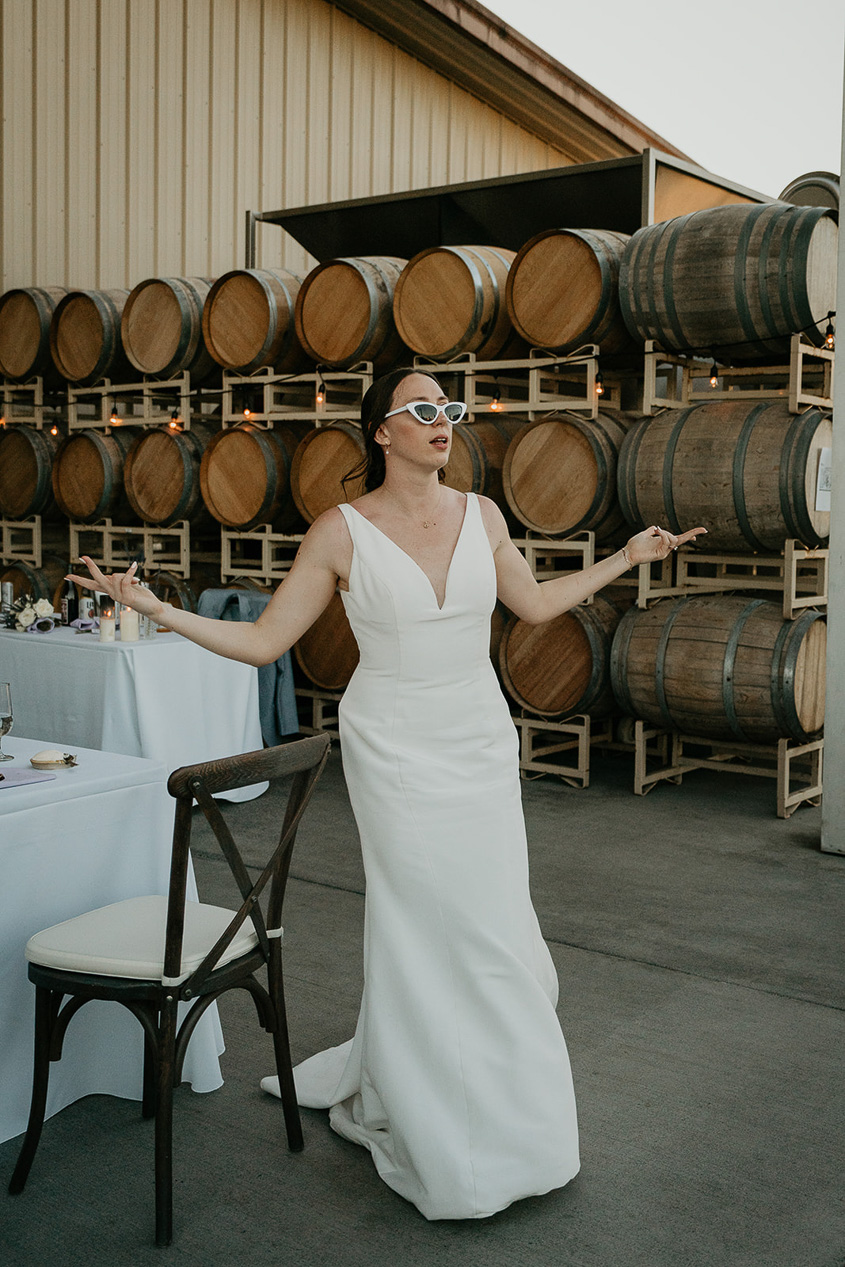 The bride cooly walking around the reception area. 