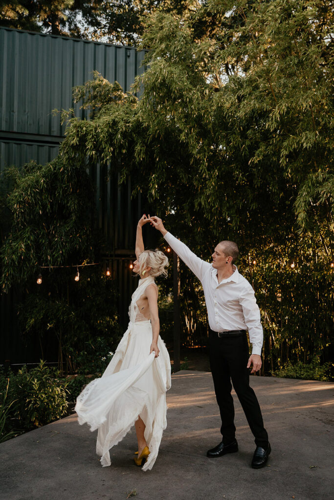 A couple dancing outside of The Griffin House 