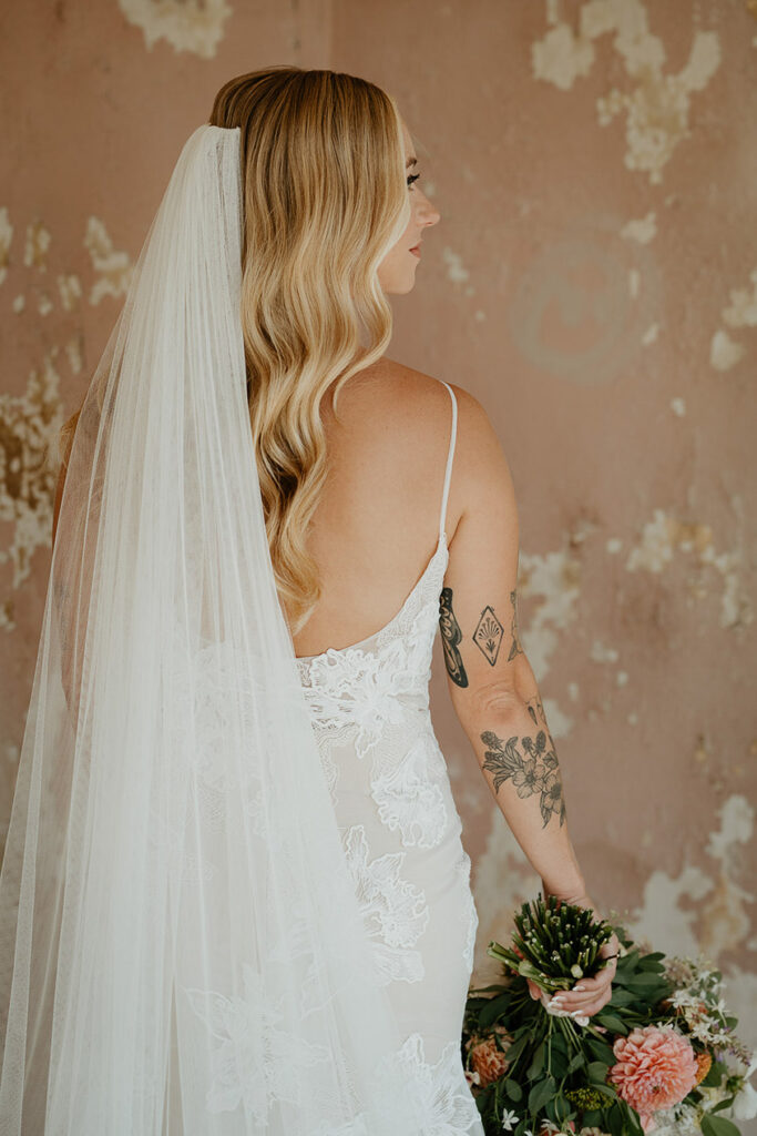 The bride showing off her veil. 